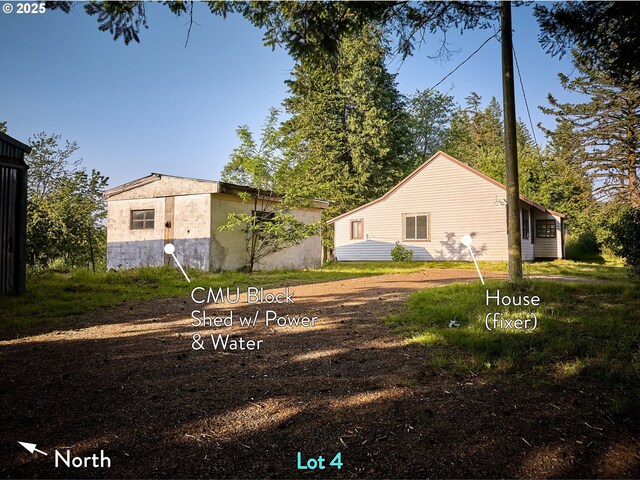 1641 Mabee Mines Rd Unit 4, Washougal, WA 98671 - view of yard with an outdoor structure