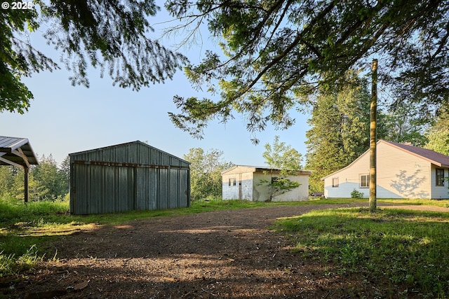 1641 Mabee Mines Rd Unit 4, Washougal, WA 98671 - view of yard featuring an outdoor structure