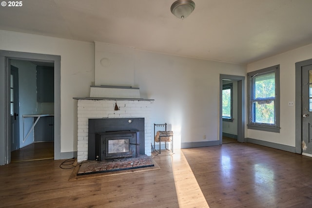 1641 Mabee Mines Rd Unit 4, Washougal, WA 98671 - unfurnished living room with wood finished floors and a brick fireplace