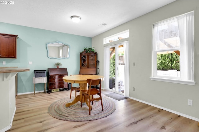 4908 Holly St, Springfield, OR 97478 - dining area featuring light wood finished floors and healthy amount of natural light