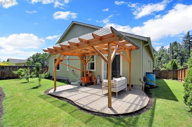 4908 Holly St, Springfield, OR 97478 - back of property with a pergola, a patio, and a fenced backyard