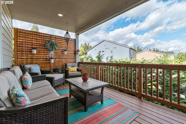 deck featuring outdoor lounge area