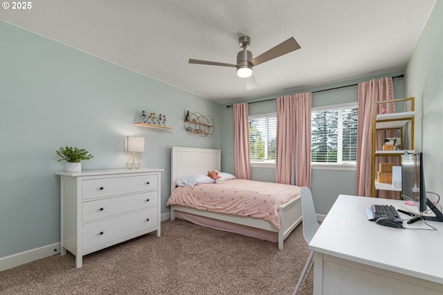 bedroom with baseboards and light carpet