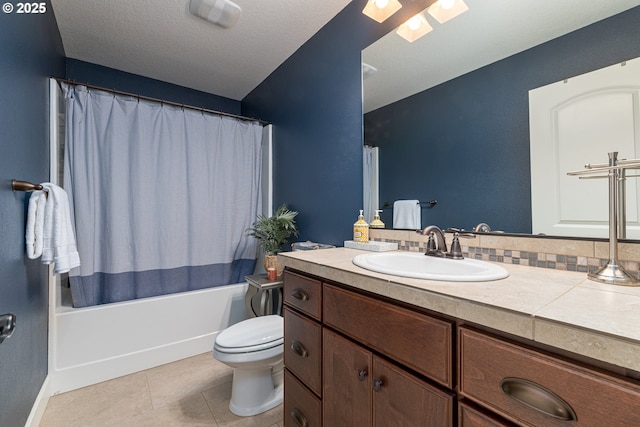 bathroom with shower / bath combo, tile patterned flooring, vanity, toilet, and a skylight