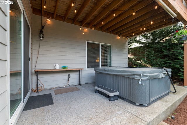 view of patio with a hot tub