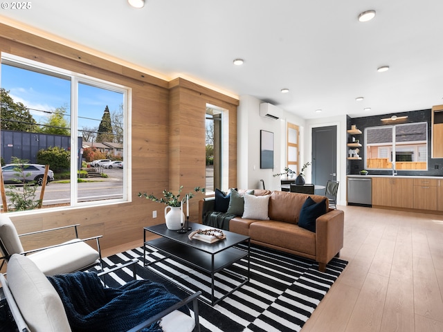 5170 SE 28th Ave, Portland, OR 97202 - living area featuring recessed lighting, wooden walls, light wood-style floors, and a wall unit AC