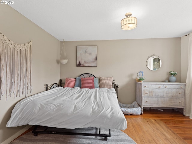 bedroom featuring light hardwood / wood-style floors