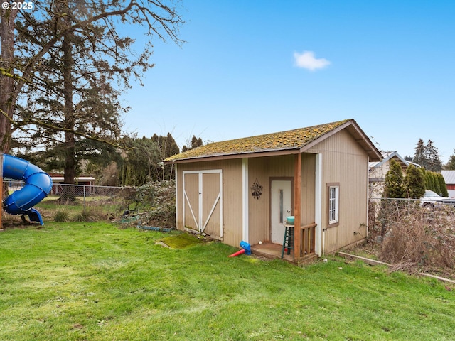 view of outdoor structure featuring a yard