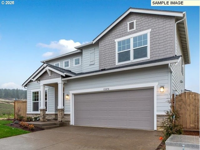 craftsman-style home with a garage