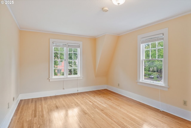 1702 24th Ave, Longview, WA 98632 - unfurnished room featuring plenty of natural light, crown molding, light wood-type flooring, and a smoke detector