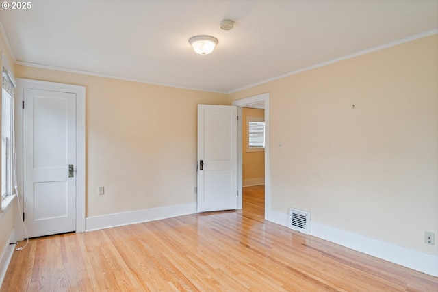 1702 24th Ave, Longview, WA 98632 - unfurnished room with light wood-style floors, ornamental molding, and a smoke detector