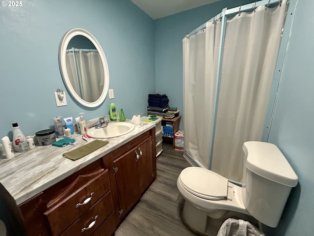 516 W Railroad Ave, Goldendale, WA 98620 - bathroom featuring toilet, a shower with shower curtain, wood finished floors, and vanity