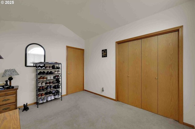 2451 Bowtie Ave, Eugene, OR 97404 - bedroom with lofted ceiling, light colored carpet, and a closet