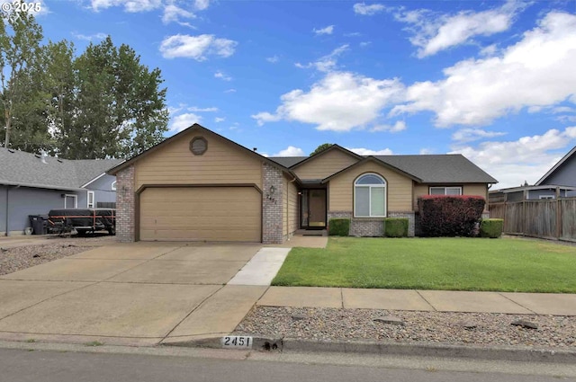 2451 Bowtie Ave, Eugene, OR 97404 - single story home featuring brick siding, an attached garage, and concrete driveway