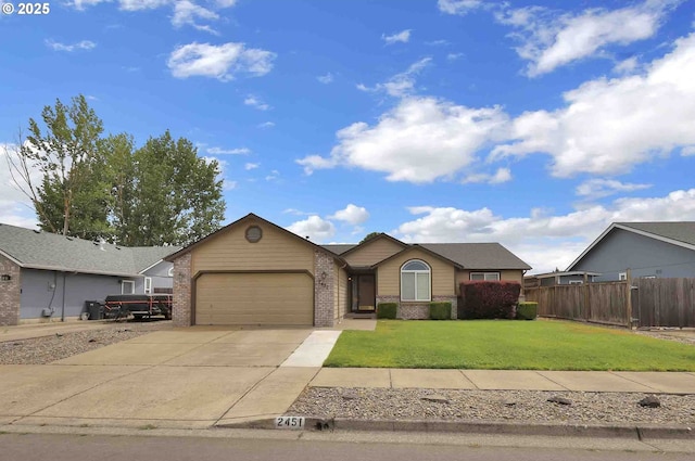 2451 Bowtie Ave, Eugene, OR 97404 - ranch-style home with an attached garage, brick siding, and concrete driveway