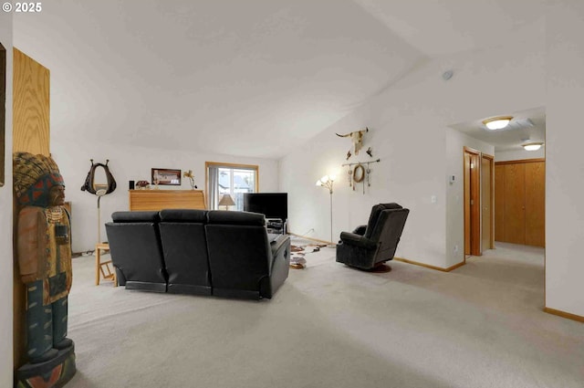2451 Bowtie Ave, Eugene, OR 97404 - carpeted living area featuring vaulted ceiling and baseboards