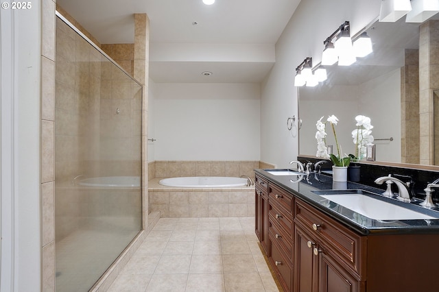 bathroom featuring vanity, separate shower and tub, and tile patterned flooring