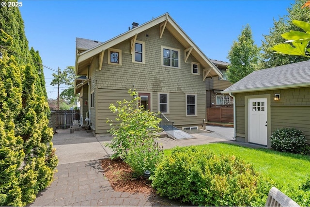 7525 SE 18th Ave, Portland, OR 97202 - back of property featuring a patio area