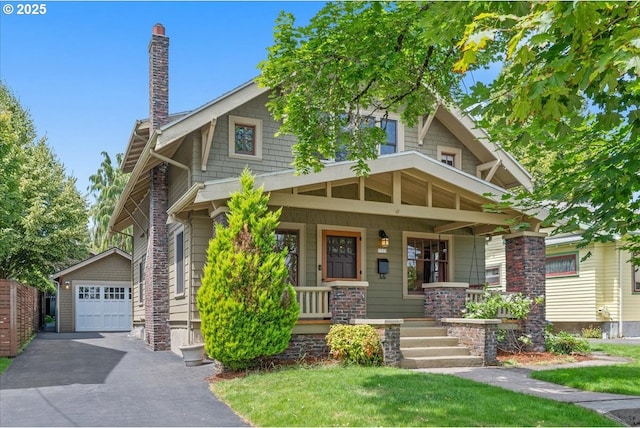 7525 SE 18th Ave, Portland, OR 97202 - craftsman inspired home with driveway, a porch, a chimney, an outbuilding, and a detached garage