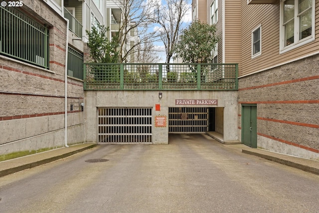 garage with concrete driveway