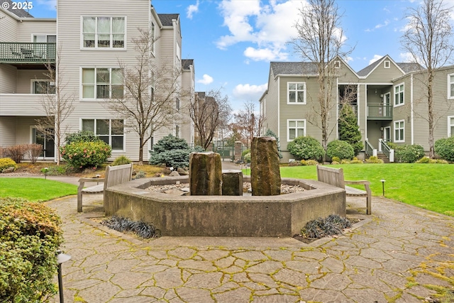 surrounding community with a lawn