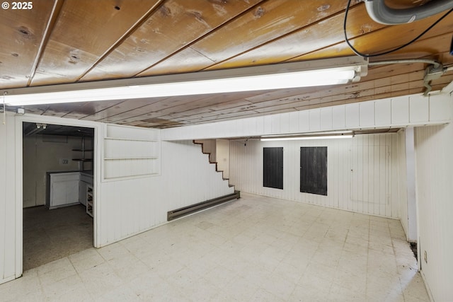 finished basement with stairway and light floors