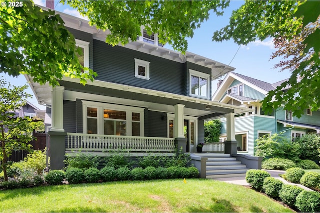 2215 NE 24th Ave, Portland, OR 97212 - view of front of house with a porch and a front yard