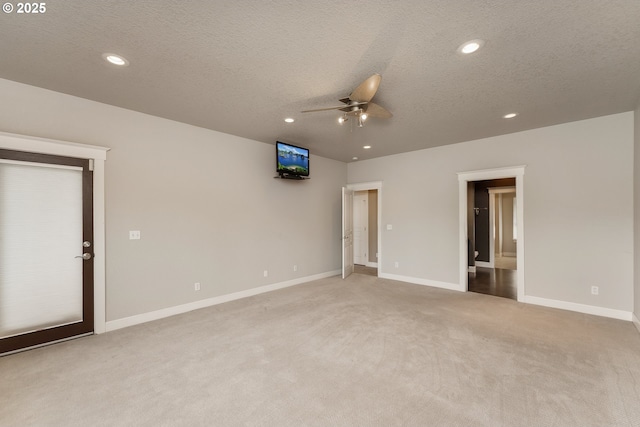 205 W Oriole Dr, Roseburg, OR 97471 - spare room featuring ceiling fan, recessed lighting, light carpet, and a textured ceiling