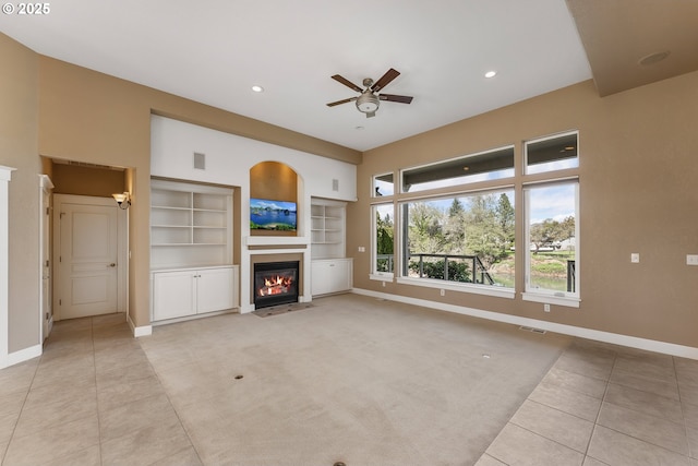 205 W Oriole Dr, Roseburg, OR 97471 - unfurnished living room with baseboards, recessed lighting, light tile patterned floors, a ceiling fan, and a fireplace with flush hearth