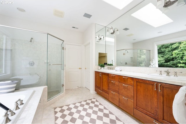 3830 NW 142nd Ter, Portland, OR 97229 - bathroom with a stall shower, a bath, double vanity, and tile patterned floors