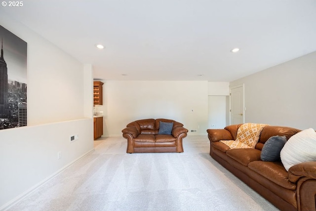 3830 NW 142nd Ter, Portland, OR 97229 - living area featuring light colored carpet, recessed lighting, and baseboards