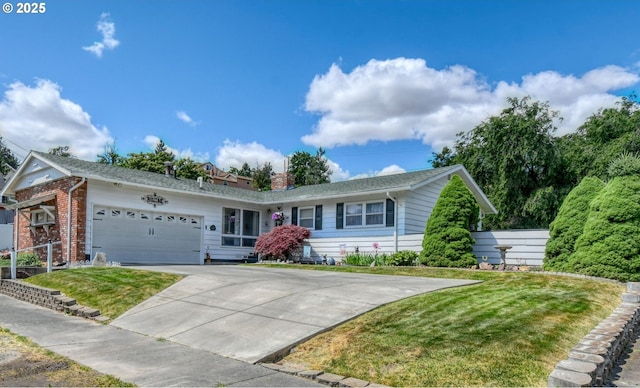 385 S Green St, Heppner, OR 97836 - ranch-style home with an attached garage, a front yard, driveway, and brick siding