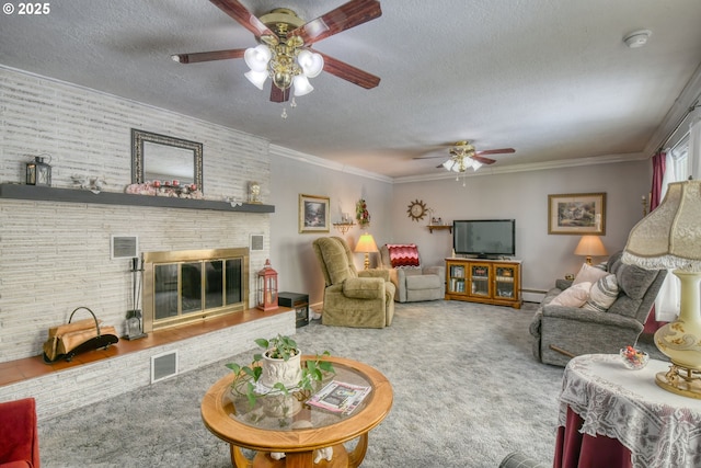 385 S Green St, Heppner, OR 97836 - living room featuring ceiling fan, a textured ceiling, carpet flooring, a brick fireplace, and crown molding