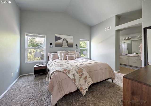 carpeted bedroom featuring baseboards, multiple windows, and visible vents