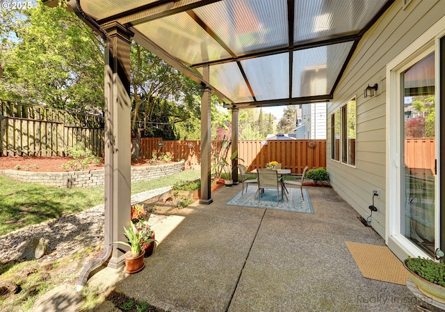 view of patio / terrace with a fenced backyard and outdoor dining space