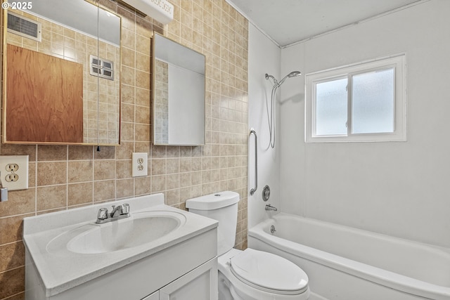 1041 19th Ave, Longview, WA 98632 - full bath featuring tile walls, toilet, vanity, and bathtub / shower combination