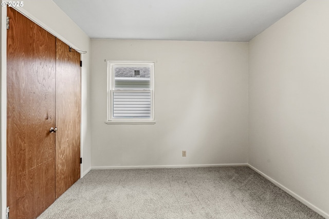 1041 19th Ave, Longview, WA 98632 - unfurnished bedroom with carpet flooring, baseboards, and a closet