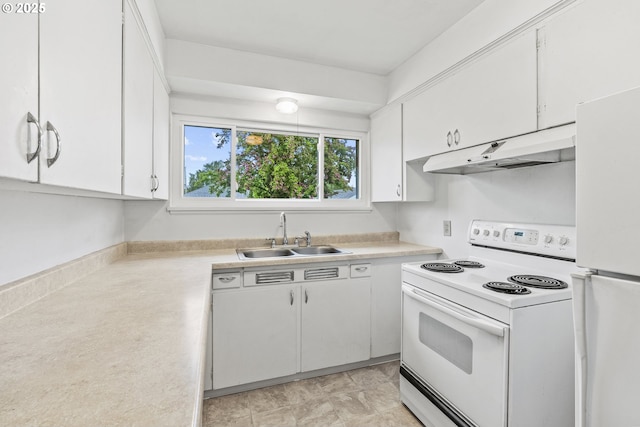 1041 19th Ave, Longview, WA 98632 - kitchen featuring white appliances, a sink, under cabinet range hood, light countertops, and white cabinetry