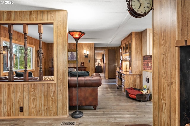 74576 Thompson Rd, Elgin, OR 97827 - living room featuring wooden walls and wood finished floors