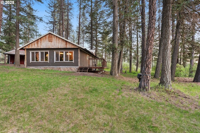 74576 Thompson Rd, Elgin, OR 97827 - rear view of property with a wooden deck and a yard