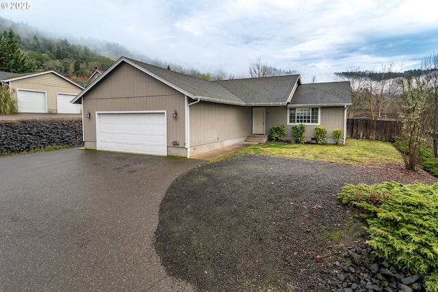 single story home with a front lawn