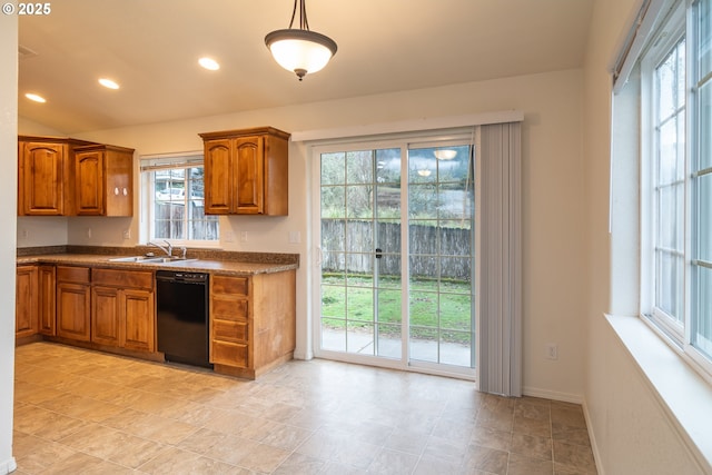 kitchen with sink, hanging light fixtures, and black dishwasher