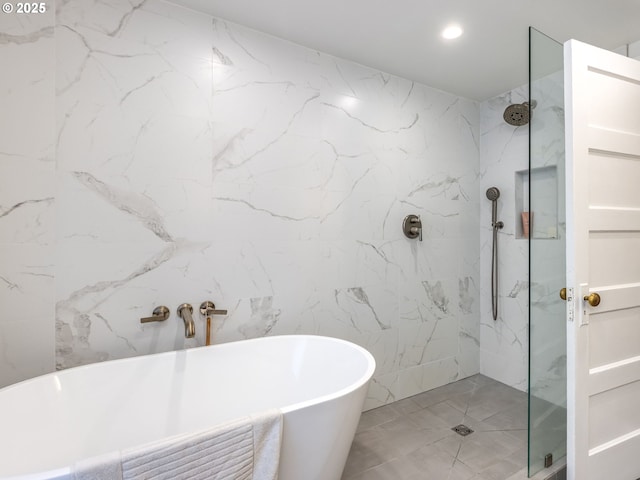 2820 SE 47th Ave, Portland, OR 97206 - bathroom with tile walls, a freestanding bath, a marble finish shower, and recessed lighting