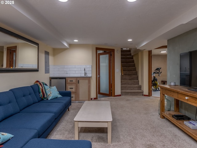 2820 SE 47th Ave, Portland, OR 97206 - living area featuring carpet floors, stairs, recessed lighting, electric panel, and bar area
