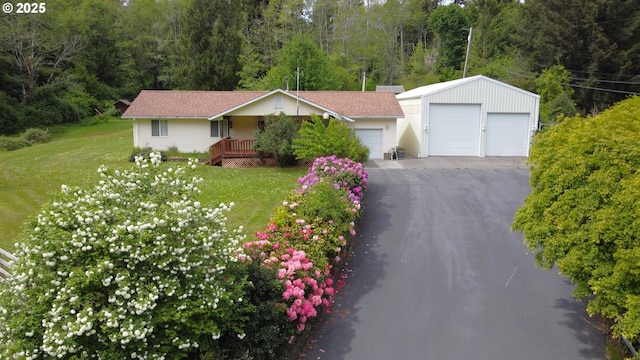 94031 Green Acres Ln, Coos Bay, OR 97420 - single story home with a detached garage, a front yard, and a porch