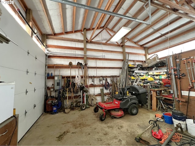 94031 Green Acres Ln, Coos Bay, OR 97420 - garage with electric panel and a workshop area