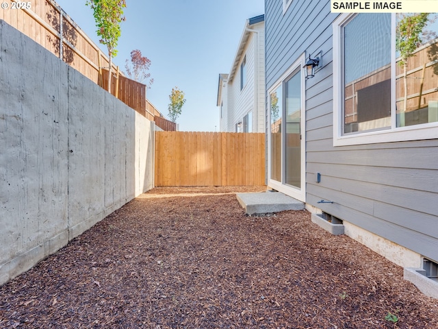 view of yard featuring a fenced backyard