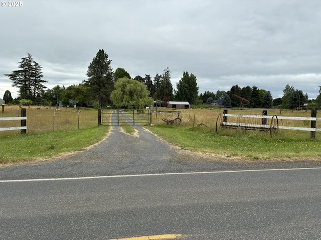 33962 Church Rd, Warren, OR 97053 - view of street featuring a gate, a view of rural / pastoral area, and a gated entry
