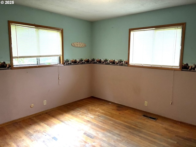33962 Church Rd, Warren, OR 97053 - spare room featuring wood finished floors