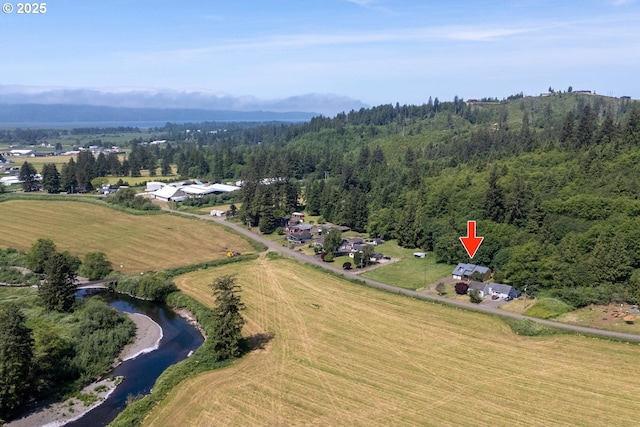 7980 Kilchis River Rd, Tillamook, OR 97141 - aerial view of sparsely populated area with a forest and a nearby body of water